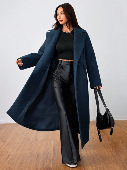 This long wool coat features casual lapels. Warm and comfortable, it is a must‑have for everyday wear, office outfits and the back‑to‑school season.