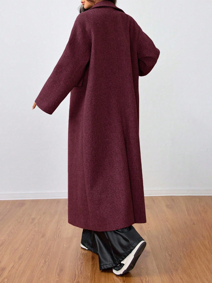 This long wool coat features casual lapels. Warm and comfortable, it is a must‑have for everyday wear, office outfits and the back‑to‑school season.