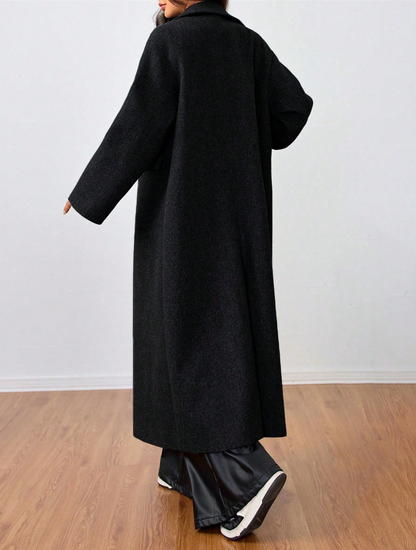 This long wool coat features casual lapels. Warm and comfortable, it is a must‑have for everyday wear, office outfits and the back‑to‑school season.