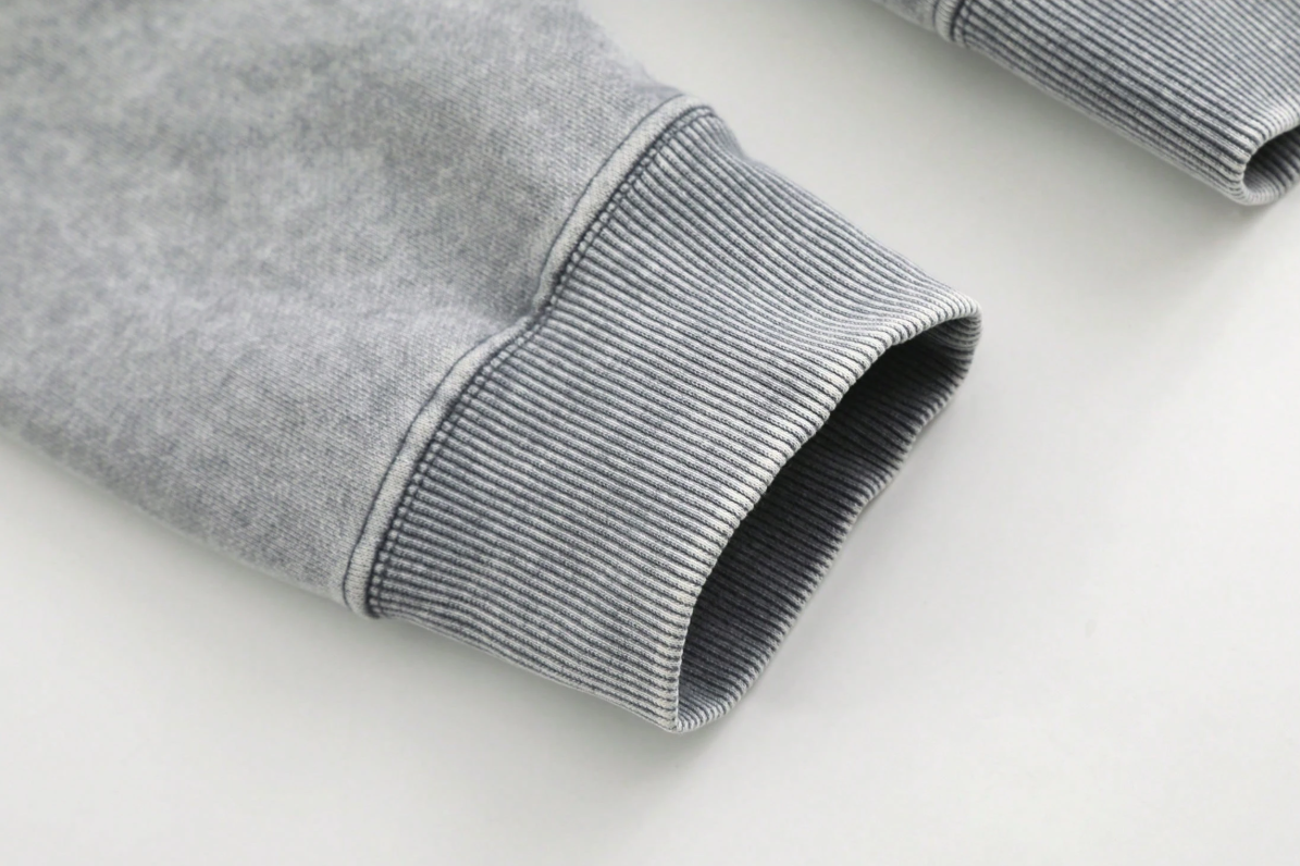 Young adults’ go-to vintage acid-washed hoodie with kangaroo pocket for daily outfits