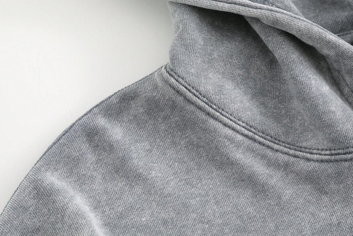 Young adults’ go-to vintage acid-washed hoodie with kangaroo pocket for daily outfits