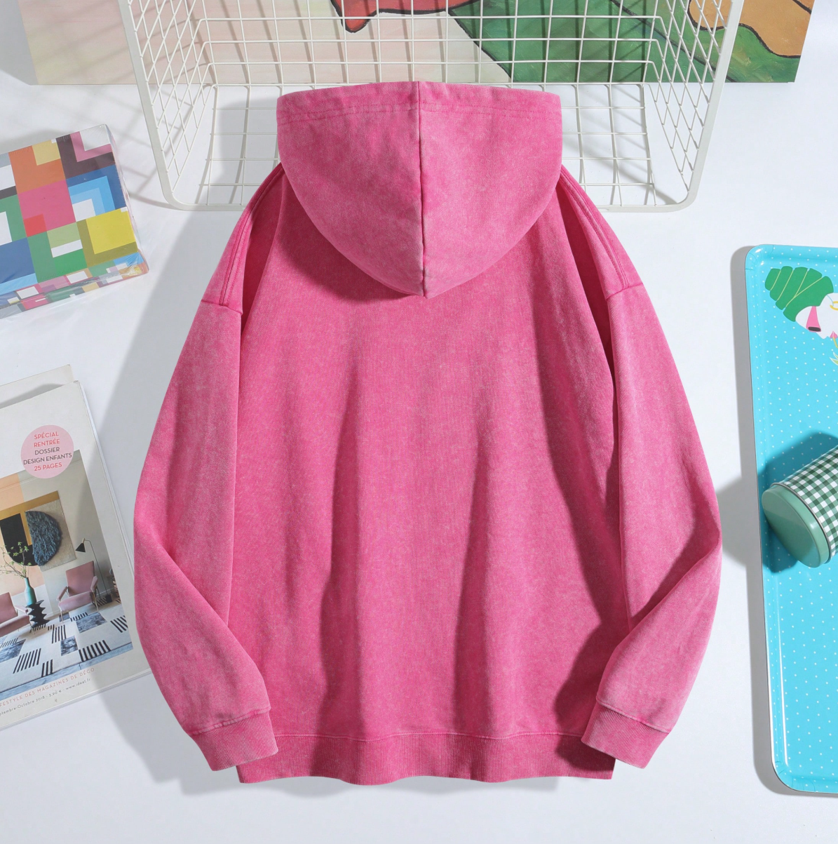 Young adults’ go-to vintage acid-washed hoodie with kangaroo pocket for daily outfits