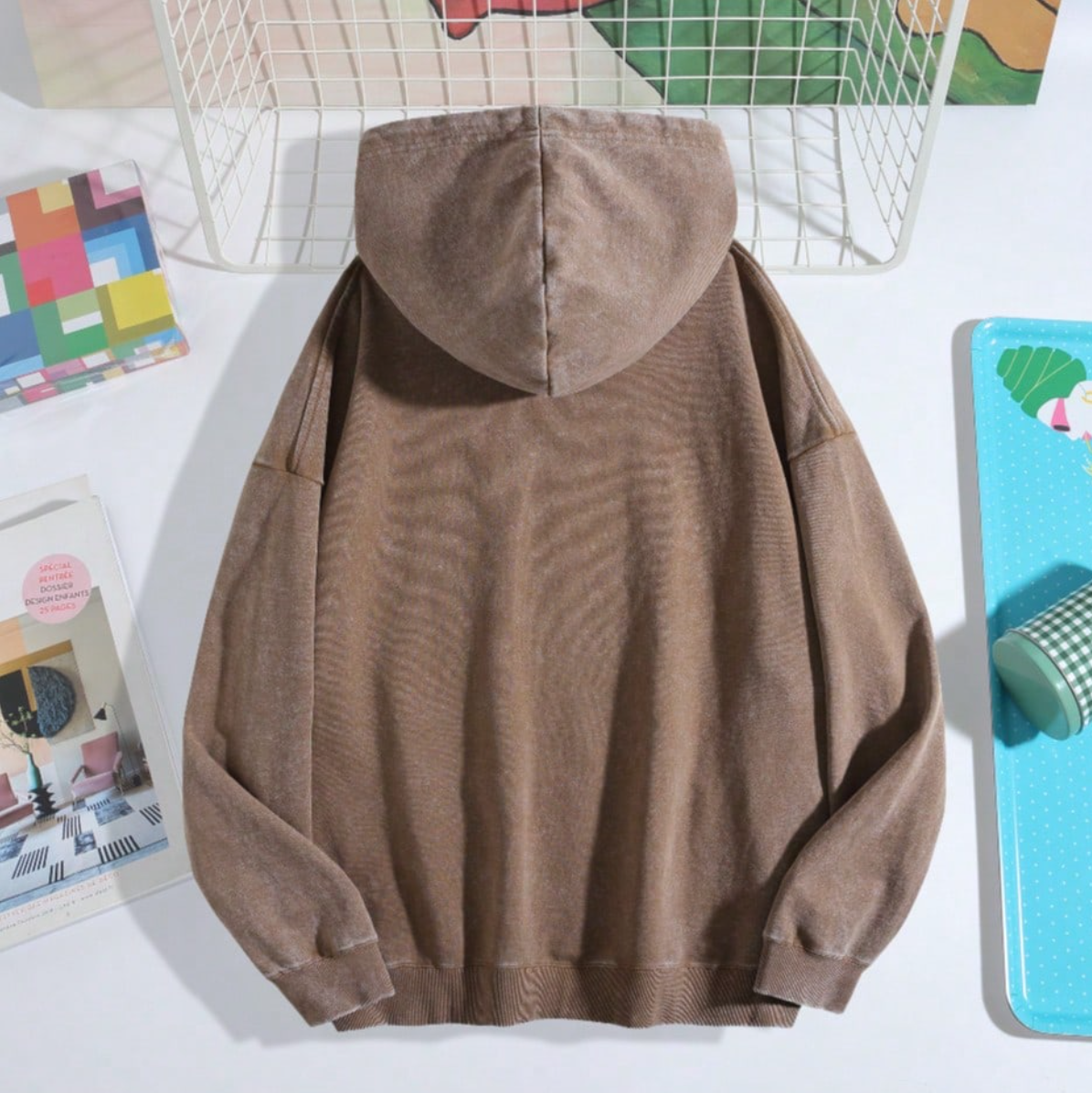 Young adults’ go-to vintage acid-washed hoodie with kangaroo pocket for daily outfits