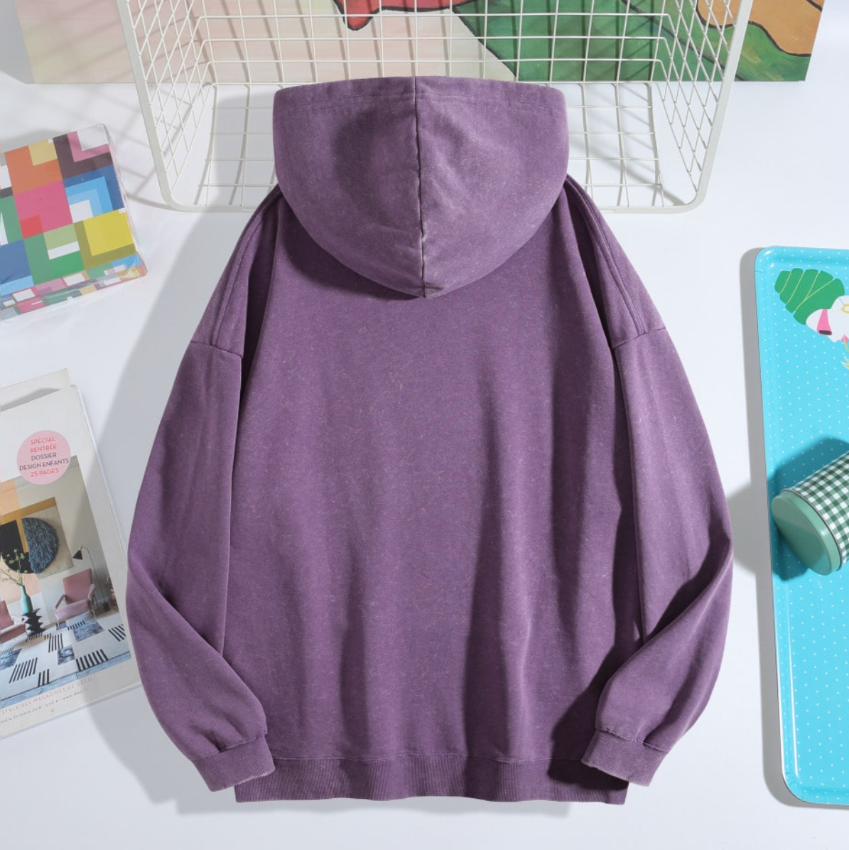 Young adults’ go-to vintage acid-washed hoodie with kangaroo pocket for daily outfits