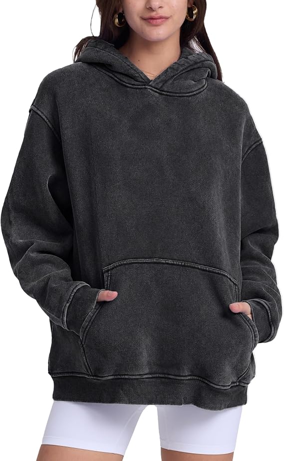 Young adults’ go-to vintage acid-washed hoodie with kangaroo pocket for daily outfits
