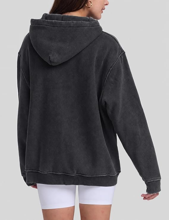 Young adults’ go-to vintage acid-washed hoodie with kangaroo pocket for daily outfits