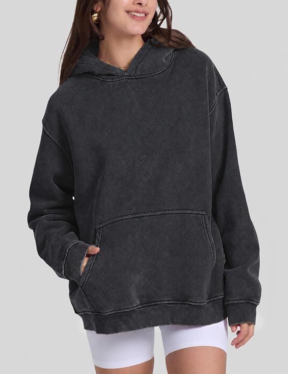 Young adults’ go-to vintage acid-washed hoodie with kangaroo pocket for daily outfits
